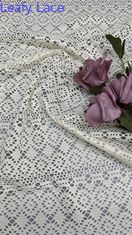 Tissu brodé en coton ajouré de luxe pour les nouvelles collections de robes