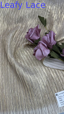 Tissu en dentelle métallique pour robes de luxe de couleur or