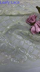 Quatre feuilles de trèfle séquence tissu brodé pour les robes respirer robes de mariée pour femmes