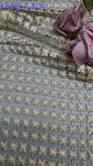 Tissu en dentelle métallique brodée ajourée étincelante respirante pour robes de mariée