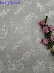 Tissu attaché de dentelle de crochet