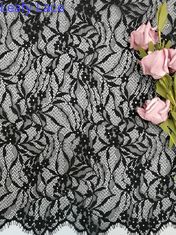 Le cil français noir de lumière de tissu de dentelle de Chantilly lacent le tissu avec le feston