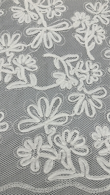 Tissu en dentelle à cordes en coton 100% Tissu en dentelle brodée élégant pour les vêtements