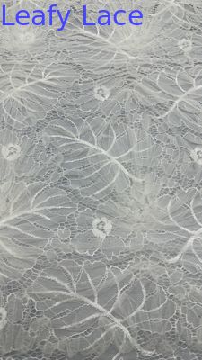 Tissu de dentelle brodée blanc et élégant tissus de mariage brodés en feuilles d'occasion