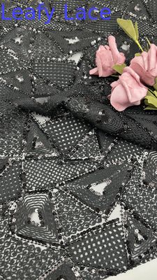 Tissu en dentelle 3D à feuilles de fleurs Tissu brodé Tissu élégant et respirant Tissu en dentelle de paille Tissu d'occasion de luxe