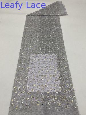 Tissu de dentelle florale métallique à feuilles brodées pour la confection de robes de mariée Tissu brillant