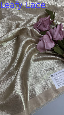 Tissu en dentelle métallique de couleur dorée pour robes de luxe broderies complexes robes de fête