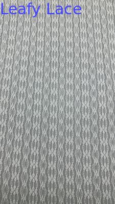 Tissu brodé de dentelle blanche à motifs de feuilles - Nouvelle collection - Motifs floraux baroques pour robes royales et romantiques