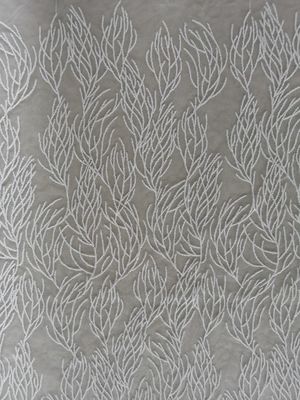 La broderie a attaché le tissu l'épousant blanc de dentelle de tissu de dentelle