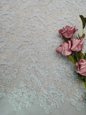 Les femmes attachantes métalliques de broderie de Tulle de crochet de tissu bleu de dentelle habillent le tissu