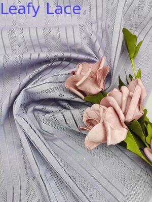 Tissu à œillets brodé, fabricant de dentelle OEM pour créateurs de mode